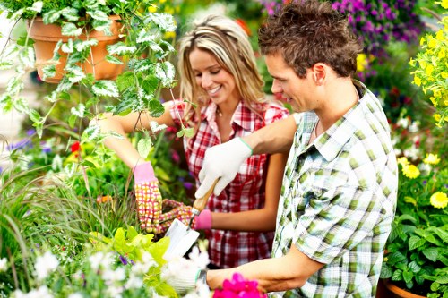 Professional Kingston upon Thames landscapers planning a stylish outdoor space